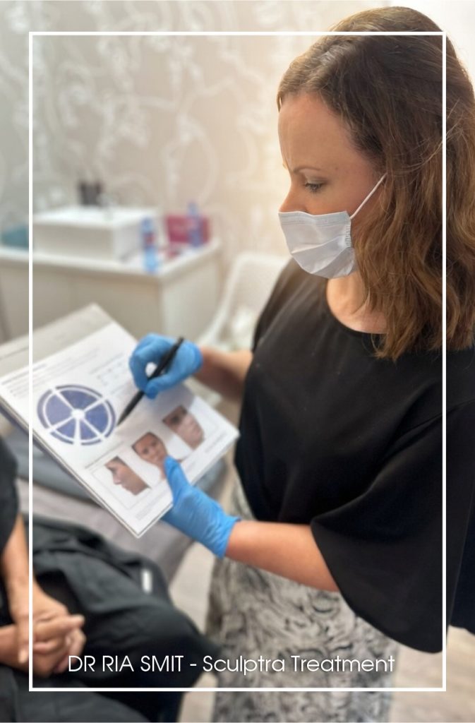 Dr Ria Smit in Paarl during Sculptra consultation, mapping contours for personalized collagen stimulation and lifted glow o Title: Precision & Passion: Your Sculptra Journey in Paarl!